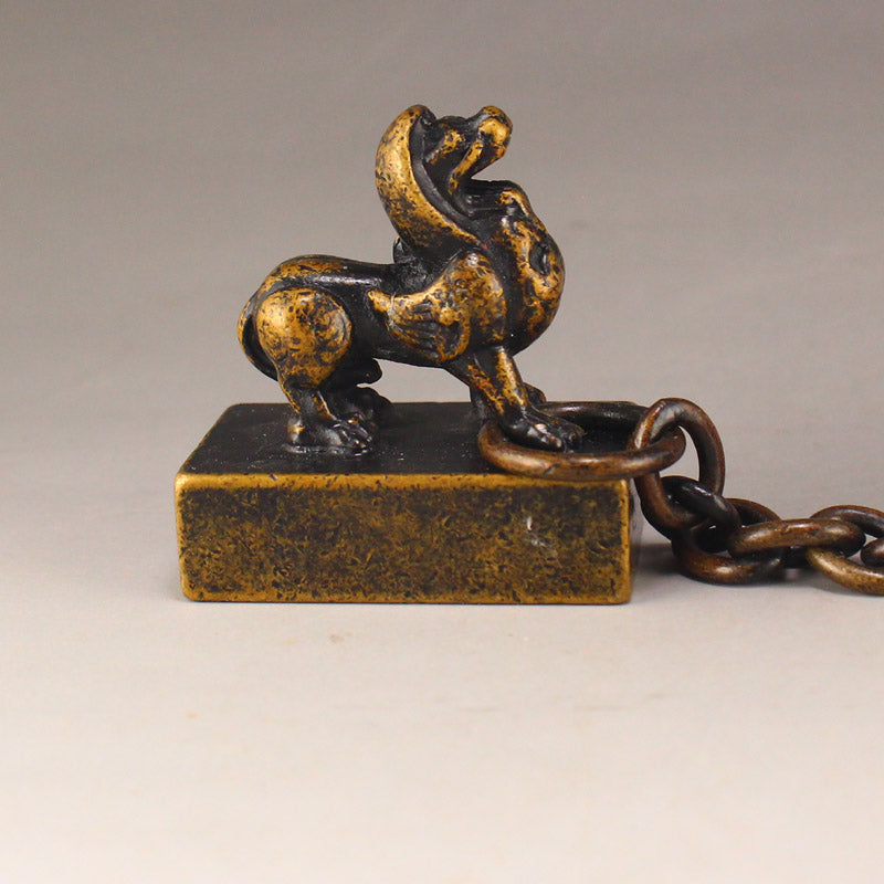 Chinese Copper Divine Beast Braced Chain Seals