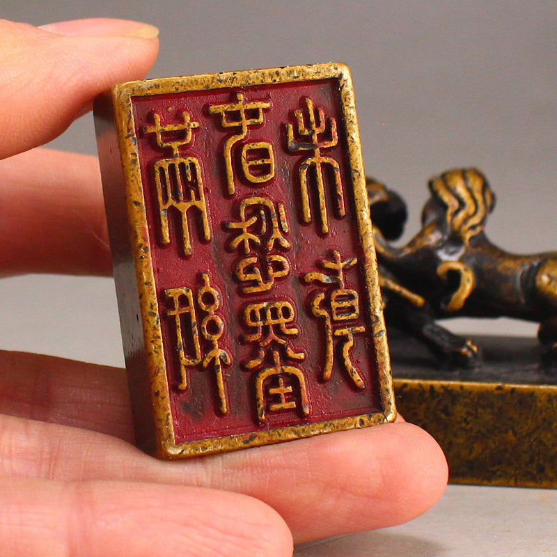 Chinese Copper Divine Beast Braced Chain Seals