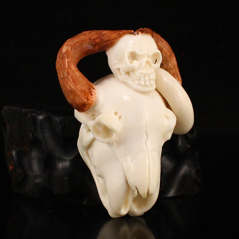 Old Ox Horn Carved Skull Pendant