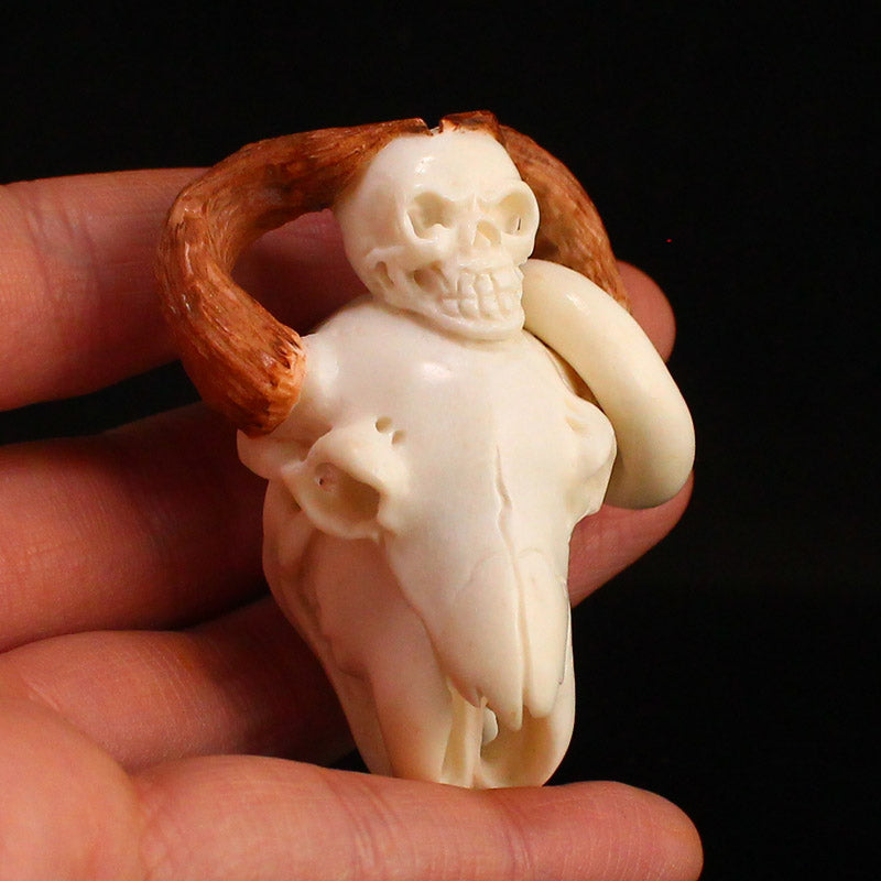 Old Ox Horn Carved Skull Pendant