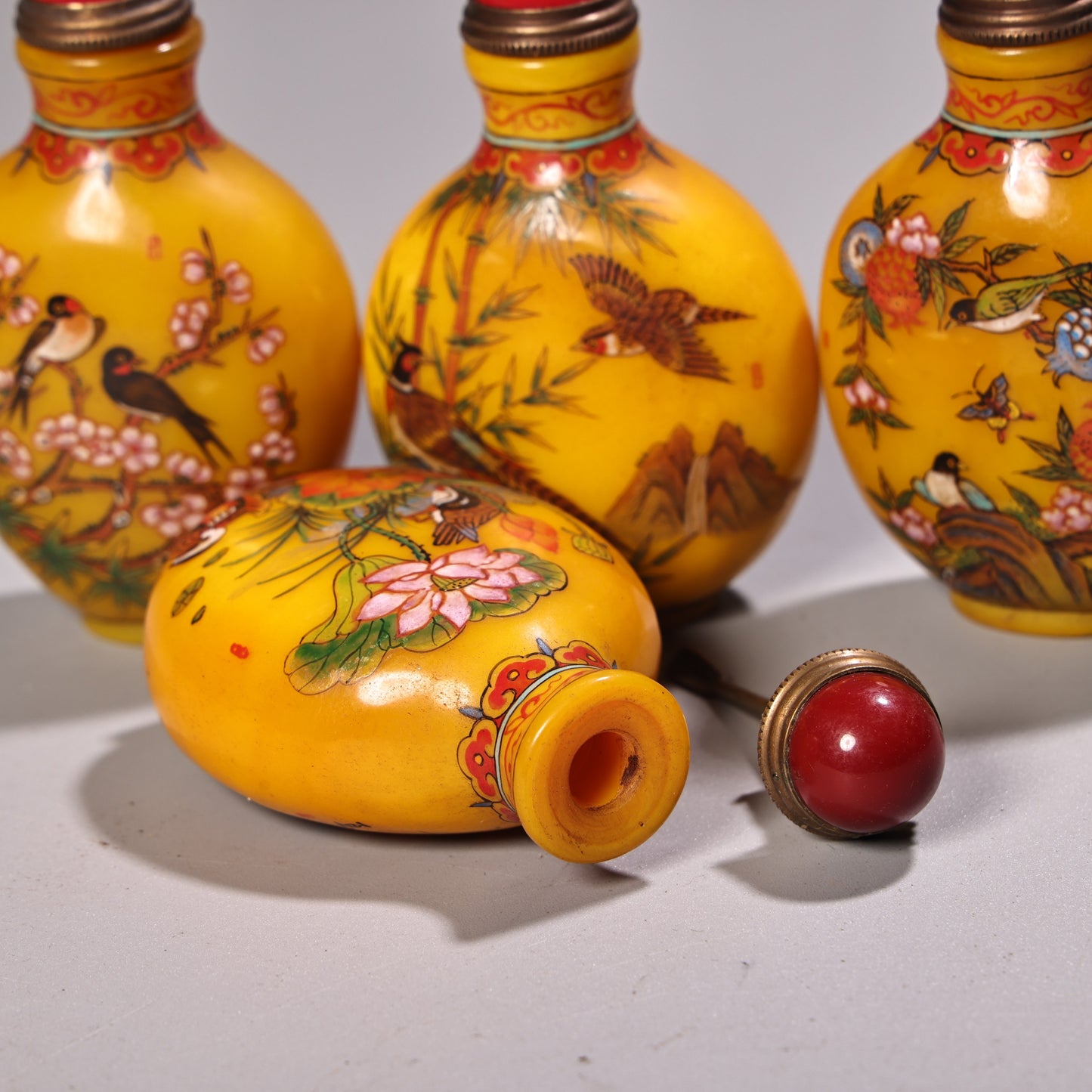 A0348 A Set Four Old Chinese Yellow Peking Glass Flower Bird Design Snuff Bottle