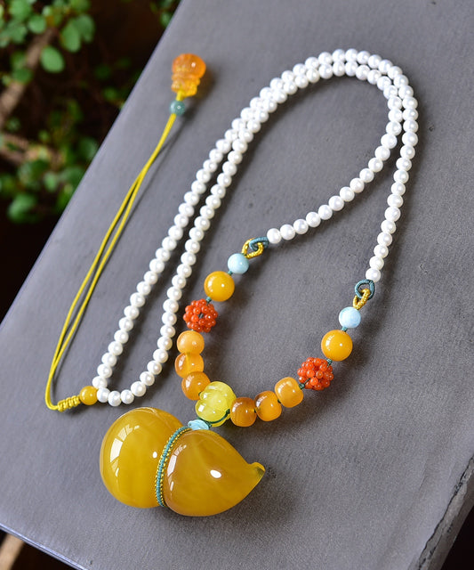 A0973 Beautiful Beeswax Carved Gourd Pendant